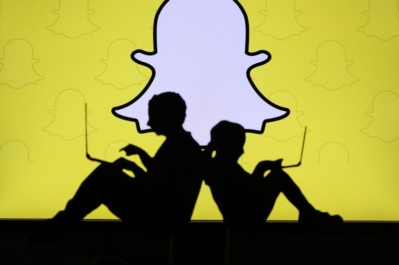 Ouder en kind samen op Snapchat