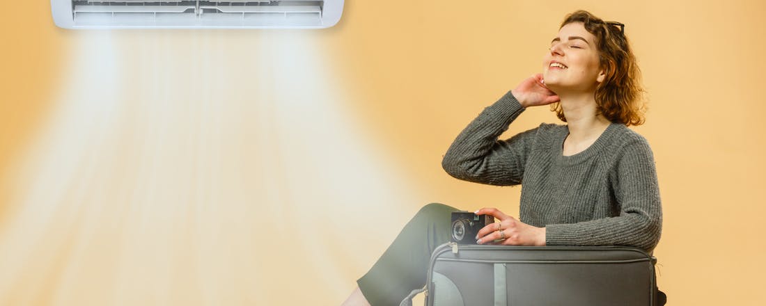 Vrouw geniet van airco 6 fouten die je niet moet maken met je airco