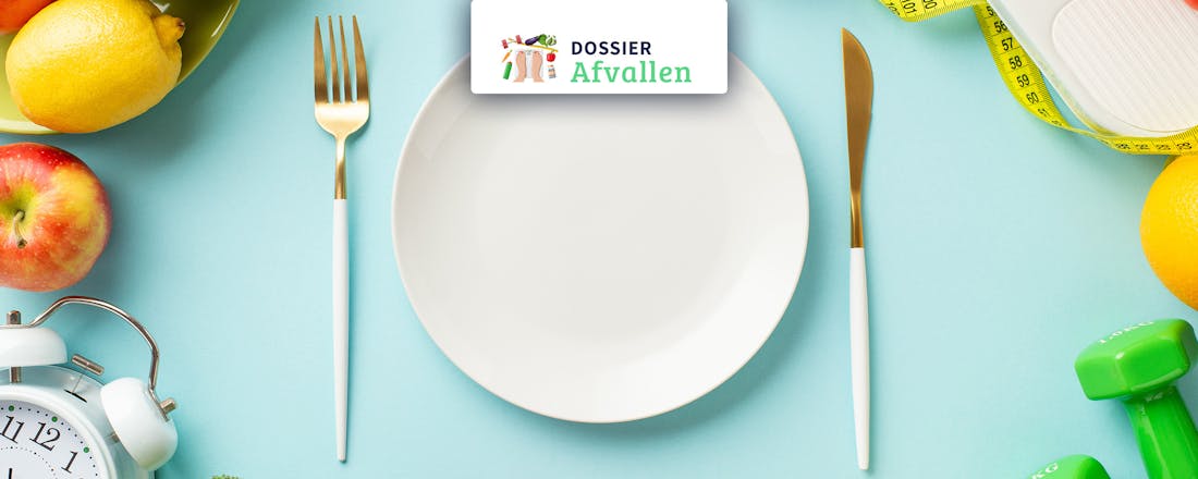 Bord met fruit en groente eromheen Afvallen? Zo pas je je eetpatroon aan