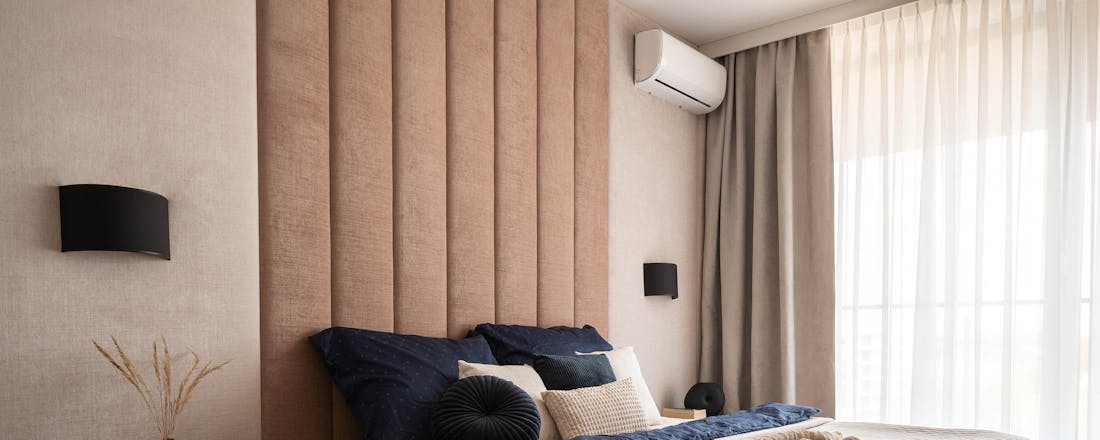 Slaapkamer met airco De grote verdwijntruc: zo werk je de airco mooi weg