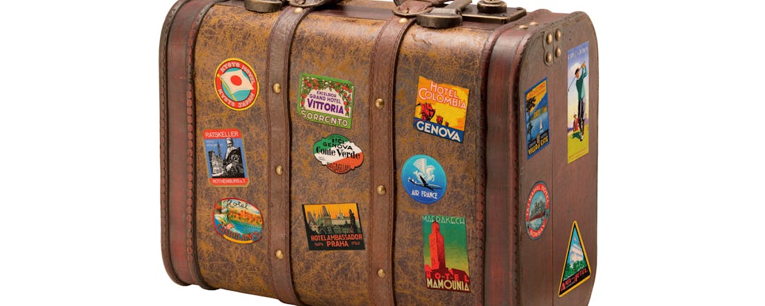 Oude koffer Geen stress: voor elke vakantie een essentiële paklijst